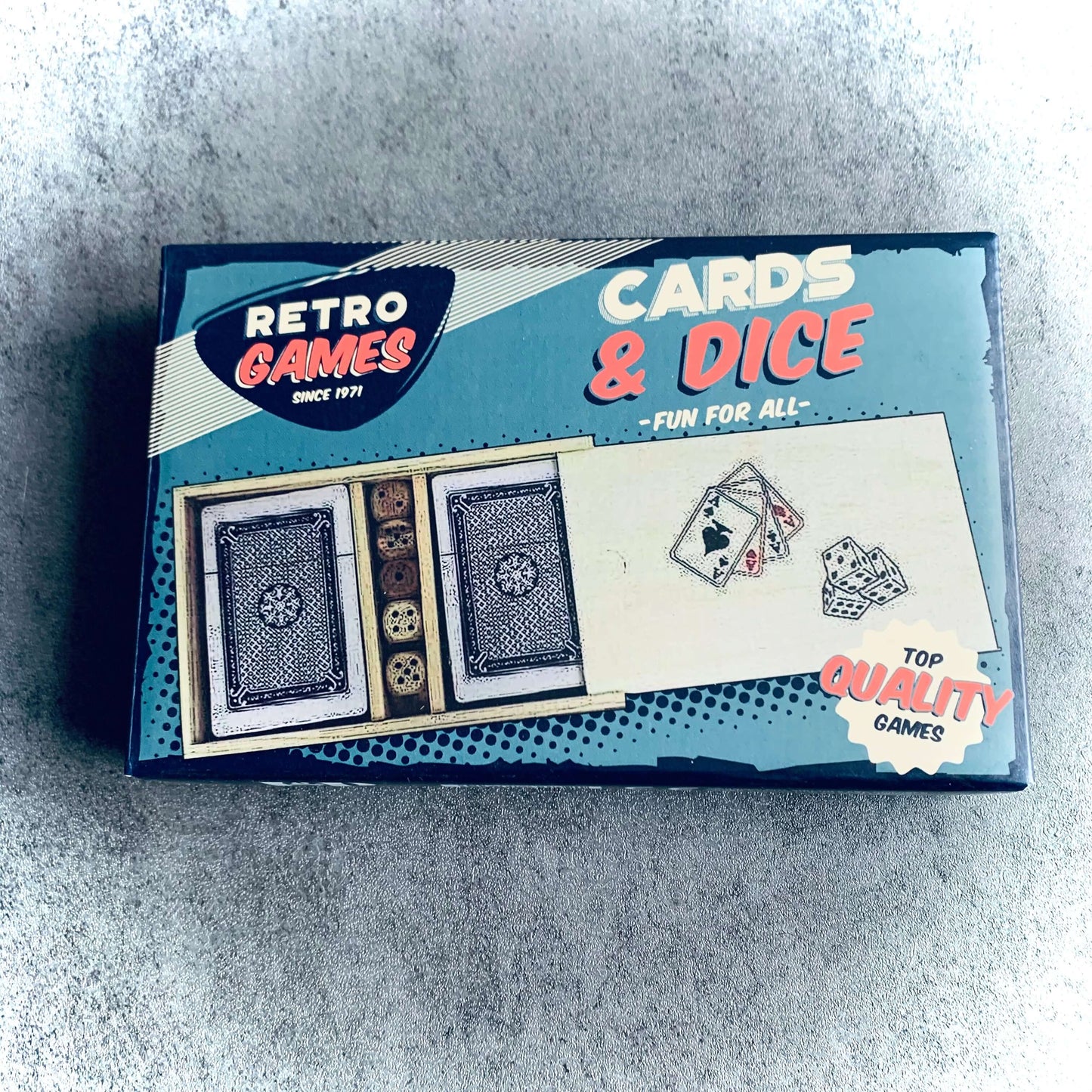 Box of retro games including cards and dice, in blue and red coloured box. From Wickerhearts Christmas and gift collection.