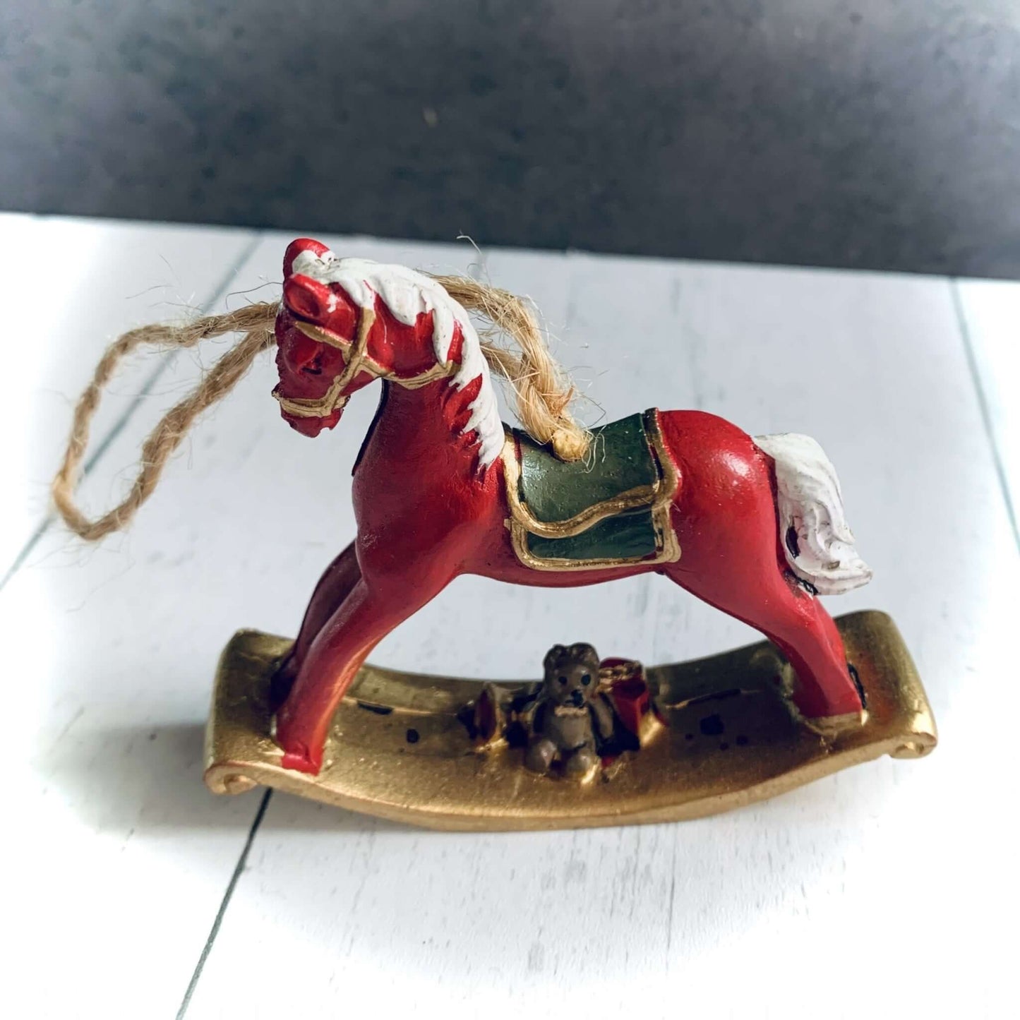 Image of red mini rocking horse hanging Christmas tree decoration. From Wickerhearts Christmas gift collection.