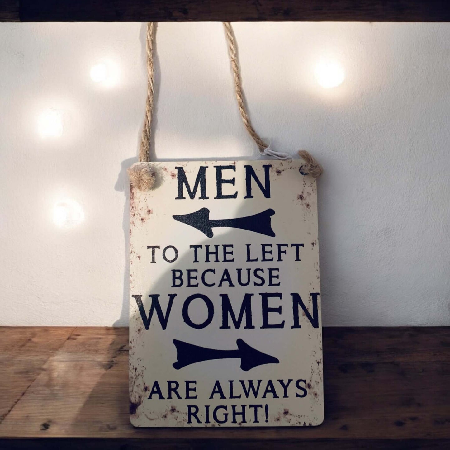 Funny mini metal sign saying 'Men to the left because Women are always right!' for home decor.