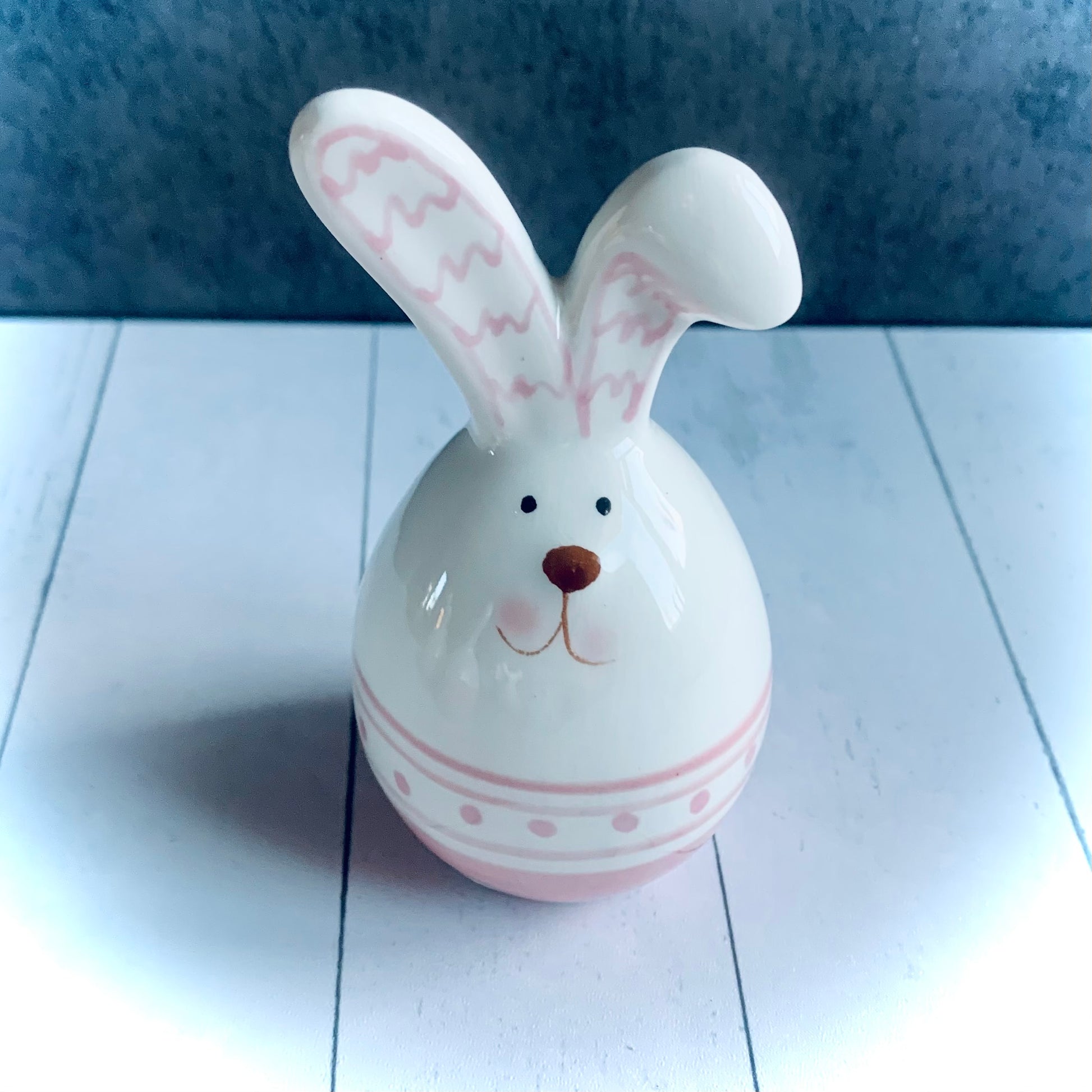 Pink and white ceramic bunny with squiggly pink lines on ears, from the Spring 2024 gift collection at Wickerhearts.