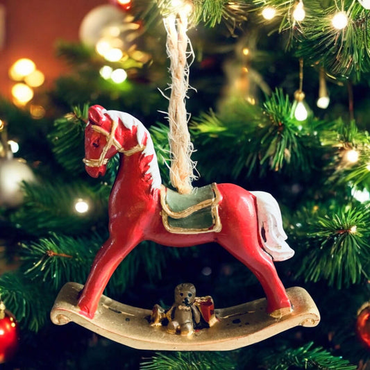 Mini Hanging rocking horse Christmas decor item in red with ornate gold decoration. From Wickerhearts Christmas gift collection.