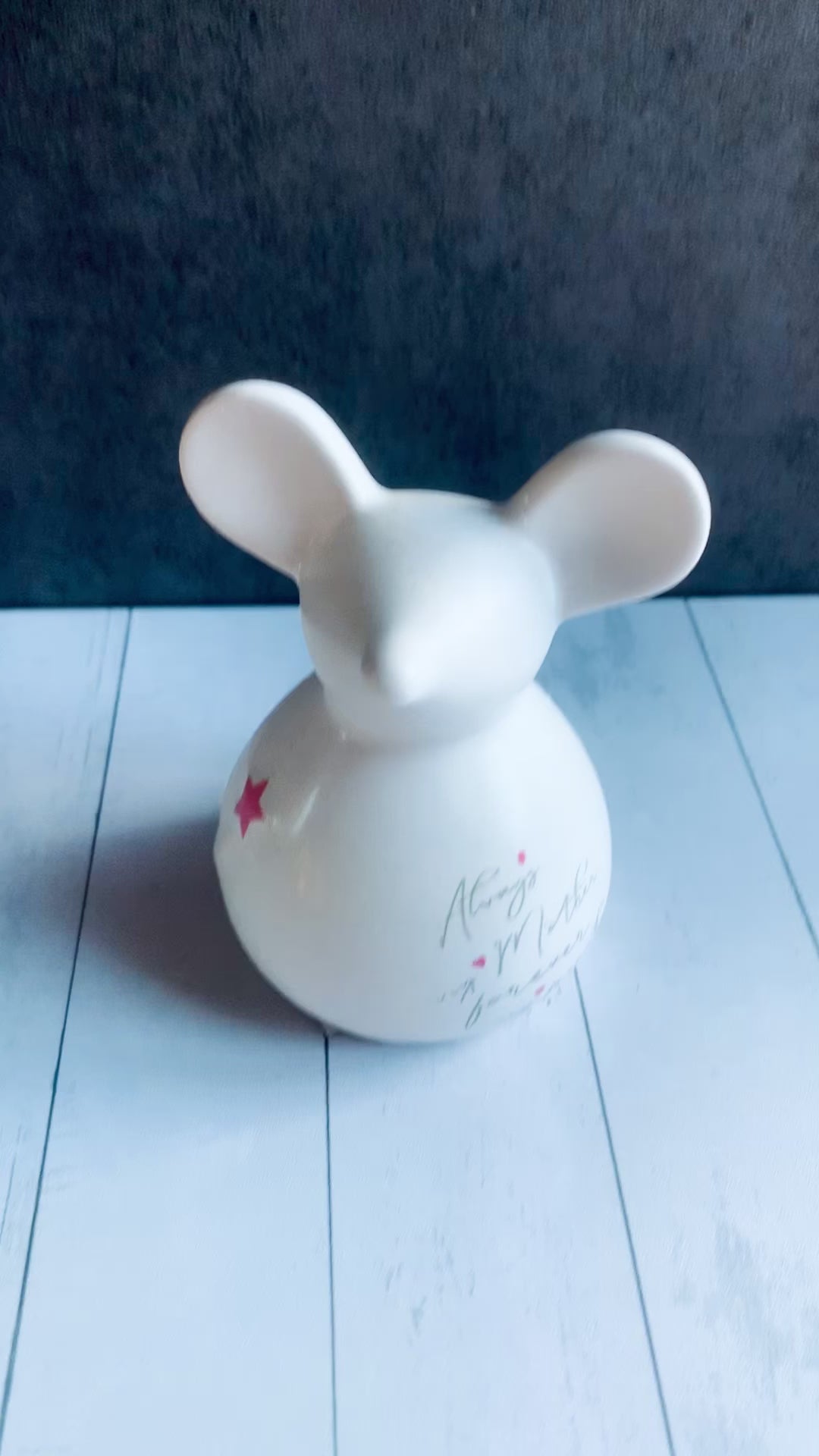 close up video of white ceramic mouse decor item. From Wickerhearts Spring and For Mum gift collection.